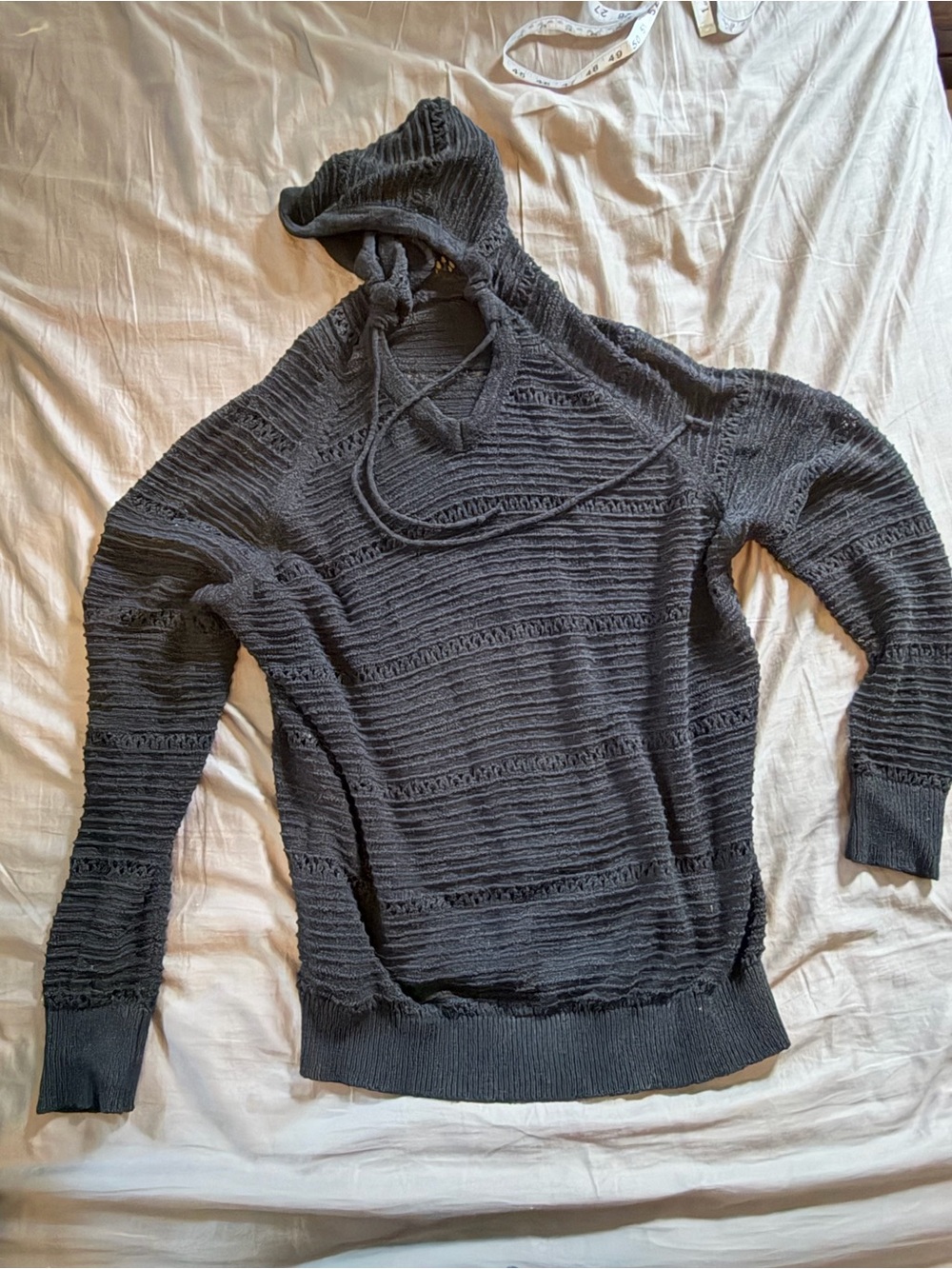 Soft textured hooded sweater